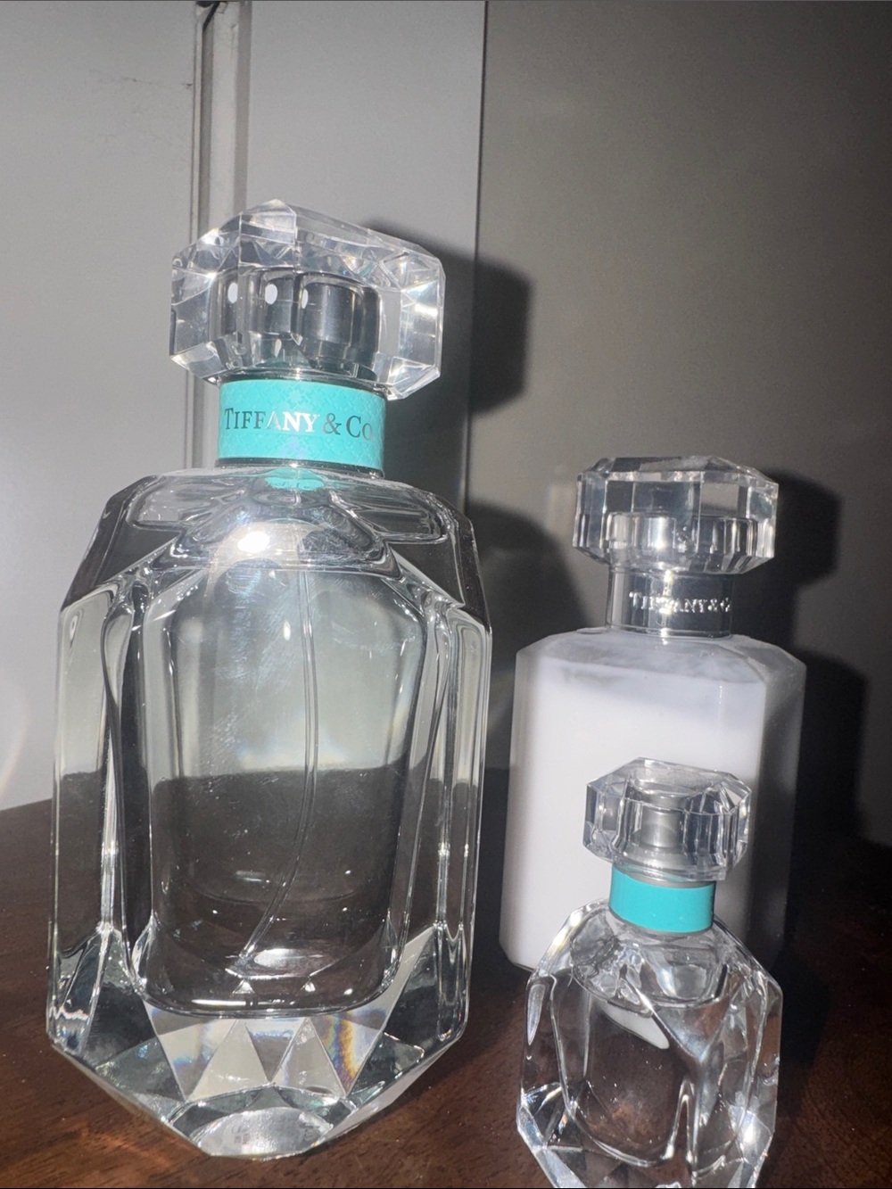 Tiffany & Co. Clear Crystal Bottles with Signature Tiffany Blue Accents